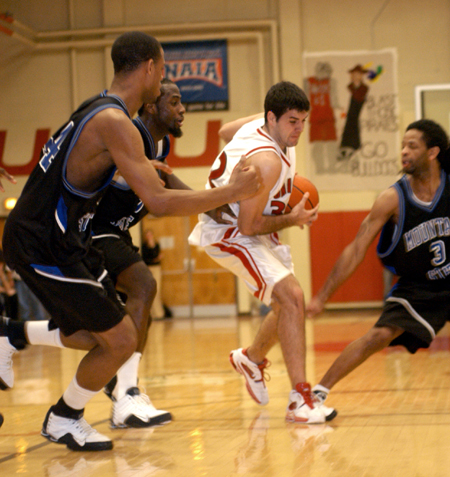 Bruno Martinessi is surrounded by three defenders during Union's game against Mountain State College. - Photo by Kristen Nicole Sayres