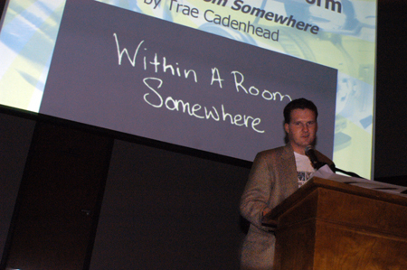 DMS major Trae Cadenhead accepts the Jury's Award for Long Form Film for his film <i>Within a Room Somewhere</i> during the 2004 Student Film Festival. - Photo by Kristen Nicole Sayres