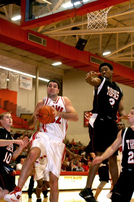 Bruno Martinessi splits three defenders as he goes up for the shot. - Photo by Kristen Nicole Sayres