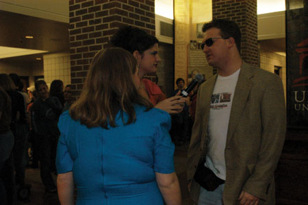 A true star filmmaker at Union, senior Trae Cadenhead is interviewed by fellow seniors and fans Becky Johnson and Jodie Curtis outside of the 2004 Student Film Festival. - Photo by Kristen Nicole Sayres