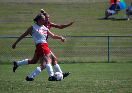 Senior Kari Bachman dribbles past a defender during a Union scrimmage. - Photo by Morris Abernathy