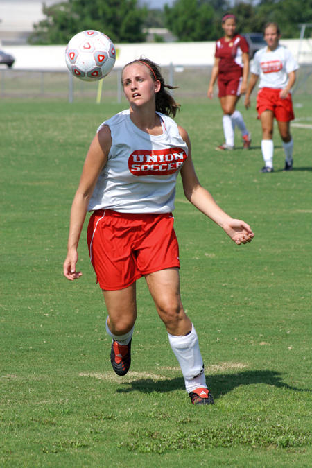 Junior Kari Bachman, nursing major, defends goal against Freed-Hardeman on Saturday, Aug. 20. This game marked the commencement of first women’s soccer season. - Photo by Kyle Kurlick