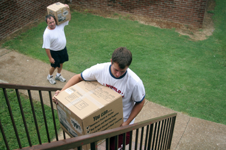 Mike MacPherson moves into his dorm room during Freshman Move-In Day. - Photo by Kyle Kurlick