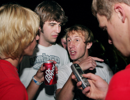 Ben Glass, Kieler Henry, Ben Trail, and Christian Christensen socializing at the Meet and Greet Party during New Student Orientation. - Photo by Kyle Kurlick