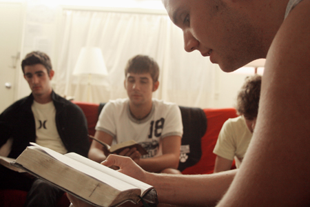 Freshmen Parker Shipp (foreground) and friends participate in a Bible study with their resident assistant during New Student Orientation. - Photo by Kyle Kurlick