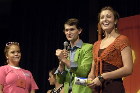 Sophomore Ronald Long leads Katie Morgan and Lindsey Gaines in a game at the SAC Game Show during New Student Orientation. - Photo by Kathleen Murray