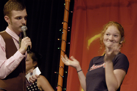 Sophomore Carson Turner asks Lily Zopfi a puzzling question at the SAC Game Show during New Student Orientation. - Photo by Kathleen Murray