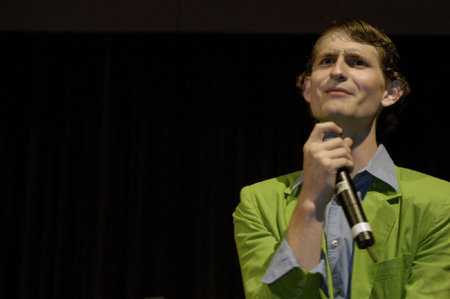 A slicked up Ronald Long entertains the crowd at the SAC Game Show during New Student Orientation. - Photo by Kathleen Murray