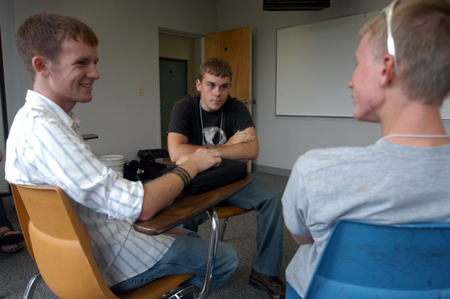 Freshmen Matthew Taylor, James Ashe, and Rob Crouch get to know each other at one of their Focus group meetings during New Student Orientation. - Photo by Brad Moore