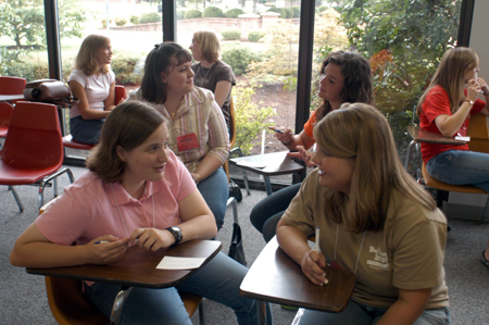 Freshmen Joy Wynn of Natchez, Miss. and Anna Townsend of Franklin, Tenn. share at one of their Focus group meetings during New Student Orientation. Also pictured: Kathleen Cooper, Kayli Anthony (2nd row); Heather Childers, Jessica Vanderpool, Kacy Coble (3rd row). - Photo by Brad Moore