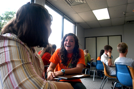 Freshmen Kathleen Cooper of West Columbia, S.C. and Kayli Anthony of Humboldt, Tenn. share a moment at one of their Focus group meetings during New Student Orientation. - Photo by Brad Moore