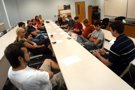 During New Student Orientation, Senior Brent Jones addresses his Focus group about the importance of keeping their relationship with Christ their top priority. - Photo by Brad Moore