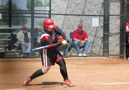 Kristen Kolter during a swing just prior to making contact during the TranSouth Conference Tournament. - Photo by Julie Powell
