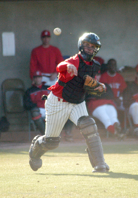 Union catcher Elvis Sosa makes a throw down to first during a game at Union's Fesmire Field. - Photo by Steven Aldridge