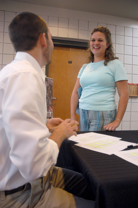 Sophomore Austin Clark welcomes Katye Baggett, a prospective student from Bartlett, TN, to Preview Day. - Photo by Brad Moore