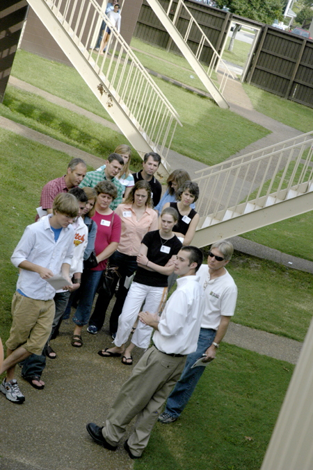 Sophomore Brent Parrish leads a group of prospective students and their families through the residence life complex on a Preview Day. - Photo by Kathleen Murray