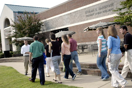 Sophomore Brent Parrish leads a group of prospective students and their families around Union's campus on a Preview Day. - Photo by Kathleen Murray