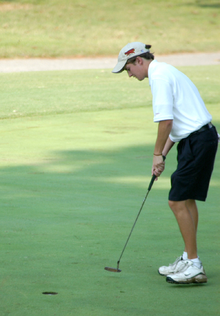 Jake Clay sinks a putt on the 18th green to finish his a round during the Union University/Hidden Valley Invitational. - Photo by Steven Aldridge