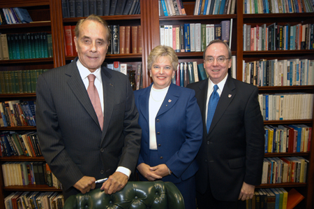 President and Mrs. Dockery host Senator Dole in the President's Office earlier in the afternoon before the 9th Annual Scholarship Banquet. - Photo by Morris Abernathy