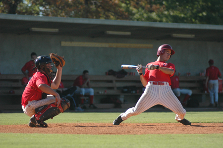 Junior outfielder Tyler Porter gets
valuable time at bat this fall in preparation for the spring season. Both softball and baseball teams have been hard at work in hopes of receiving an invitation to the NAIA world series. - Photo by Kristen Nicole Sayres