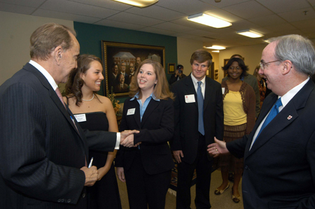 Bob Dole visits with Union students Katie Daniel (center) and Annie Ross (right) prior to the 9th Annual Scholarship Banquet. - Photo by Morris Abernathy