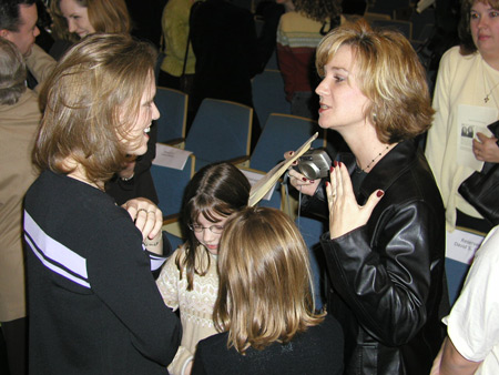 Heather Mercer talks with a community member following the chapel service held at Union. - Photo by Cam Tracy