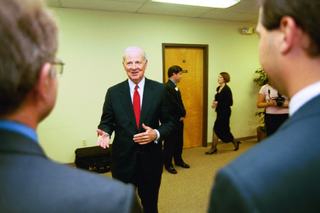 James Baker speaks with several faculty and students on campus before the Scholarship Banquet. - Photo by Jim Veneman