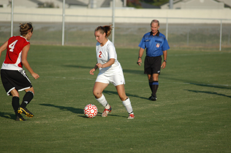 Freshman Megan Okerson attempts to advance the ball up the field versus Martin Methodist College. - Photo by Steven Aldridge
