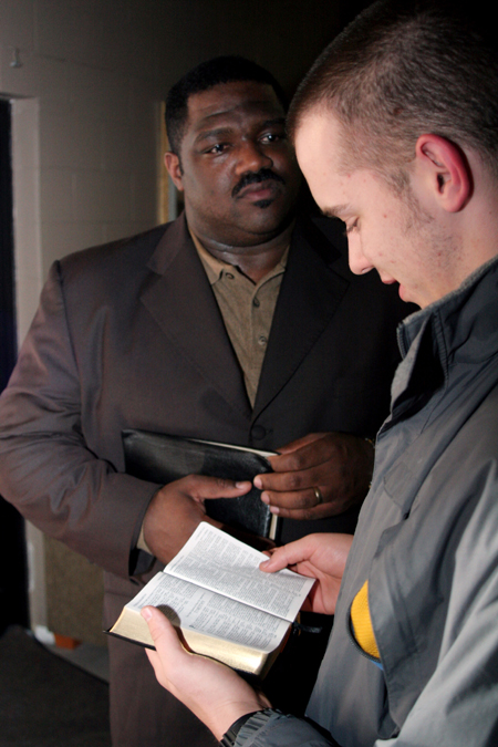 David Wickiser gets a chance to speak with Voddie Baucham after a session in Hurt Commons. - Photo by Kyle Kurlick