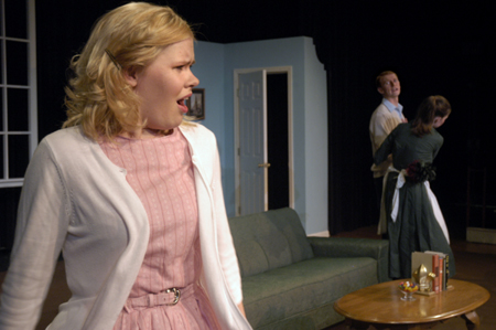 Heather Kapavik pulls Jared New away from Courtney Braswell during <i>Tartuffe</i>. - Photo by Kathleen Murray