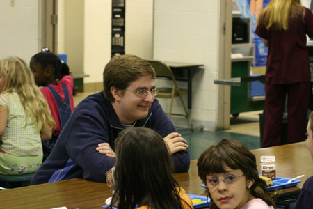 Sophomore Tyler Whetstone spent time with students at South Elementary during his Day of Remembrance service project. - Photo by Derek Ownby