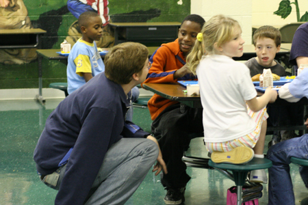 Sophomore Tyler Whetstone spent time with students at South Elementary during his Day of Remembrance service project. - Photo by Derek Ownby