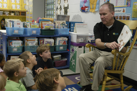 Mark Kahler, associate vice president for university communicaitons, spent his Day of Remembrance at Jackson Christian School reading to children. - Photo by Kathleen Murray