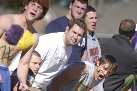 The men of Lambda Chi Alpha cheer their brothers on at the Greek Olympics. - Photo by Kathleen Murray