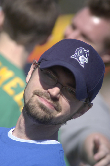 Director of Student Programs Justin Phillips enjoys the Greek Olympics. - Photo by Kathleen Murray
