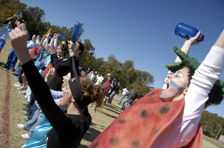 Sophomore Sarah Patch and her sisters cheer on the Zetas at the Greek Olympics. - Photo by Kathleen Murray