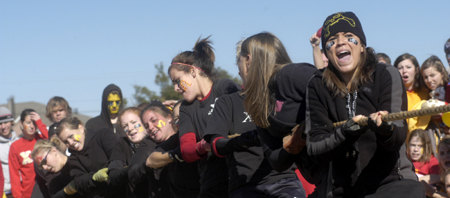 The ladies of Chi Omega dig down deep during the Greek Olympics. - Photo by Kathleen Murray