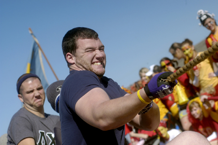 Lambda Chi Sean Blakley leads the charge during the tug of war at the Greek Olympics. - Photo by Kathleen Murray