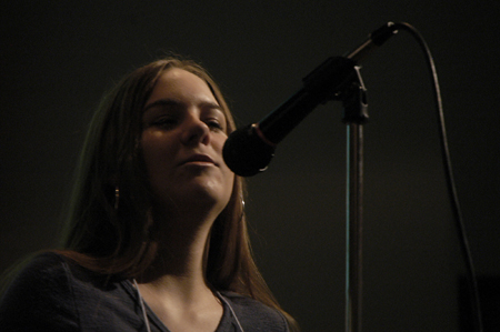 Junior Filmmaker Amy Cheek accepts a Trivial Award for her film <i>Unlikely Places</i> at the Third Annual Union Student Film Festival. - Photo by Kathleen Murray
