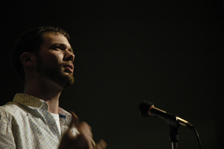 Junior Filmmaker Daniel Lindley accepts the award for Best Animation for his film <i>Consecutive Serial Numbers</i> during the Third Annual Union Student Film Festival. - Photo by Kathleen Murray