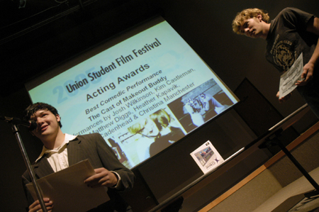 Tyson Cadenhead and Matthew Diggs accept their awards for Best Comedic Performance in <i>Makeout Buddy</i> during the Third Annual Union Student Film Festival. - Photo by Kathleen Murray