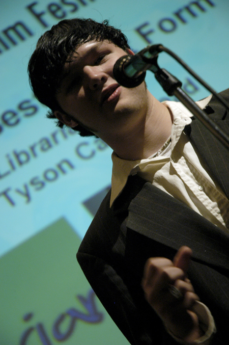 Junior Tyson Cadenhead accepts his award for Best Short Form Film for his stop-motion animation piece <i>The Librarian</i> during the Third Annual Union Student Film Festival.  This award came with a prize of $150. - Photo by Kathleen Murray