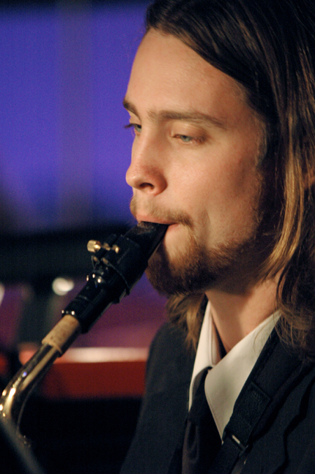 Andy McBride played the saxophone during <em>A Union Christmas</em>. - Photo by Brad Moore