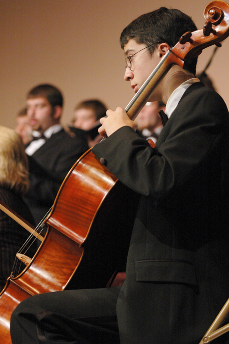 Philip Tang played the cello during <em>A Union Christmas</em>. - Photo by Brad Moore