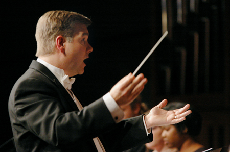 Stanley Warren led the University Singers during <em>A Union Christmas</em>. - Photo by Brad Moore