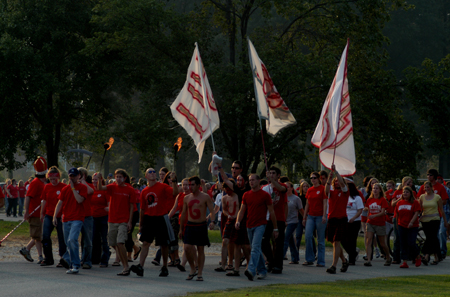 A massive soccer pep rally makes their way across the campus to the first home games of the season. - Photo by Morris Abernathy