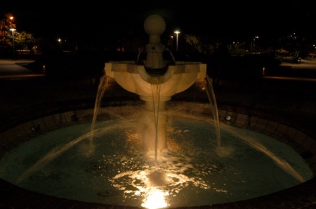 The Class of '63 Fountain outside of the Penick Academic Complex at night. - Photo by Morris Abernathy