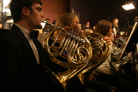 Jeremy Hanks and the rest of the French horn section performed during <em>A Union Christmas</em>. - Photo by Kyle Kurlick