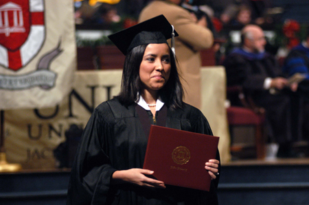Estela Argueta, of Guatemala, shows off her bachelor of arts degree in intercultural studies during fall graduation. - Photo by Morris Abernathy
