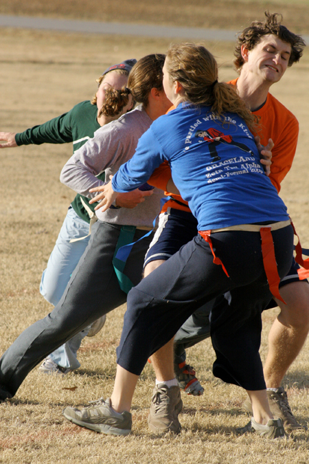 Sophomore Ronald Long blocks for teammate D.L. Fruge during the Young Alums' Turkey Bowl. - Photo by Kyle Kurlick